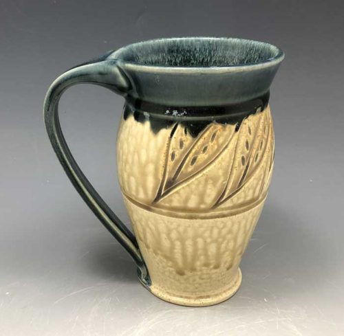 Large Carved Mug Teal and Tan with Leaves