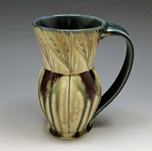 porcelain mug, teal and tan, leaf pattern