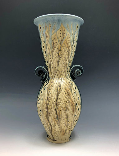 Teal and Tan stoneware hand carved vase with leaf pattern by Ira Burhans
