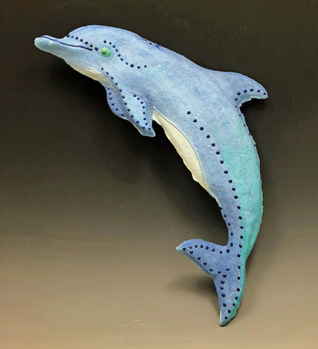 dolphin jumping, handmade paper casting by Barbara Melby Burhans