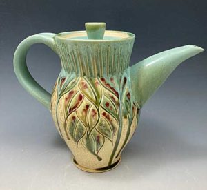 stoneware teapot with leaf carving