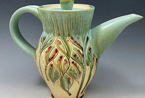 Light Green and Tan Teapot with Leaf Pattern