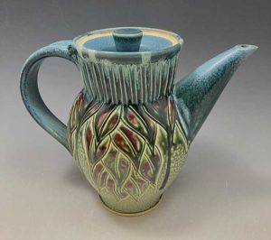 Wheel-thrown, hand carved stoneware teapot by Ira Burhans