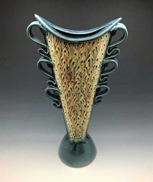 24 1/2 inch tall stoneware vase with hand carved leaf pattern